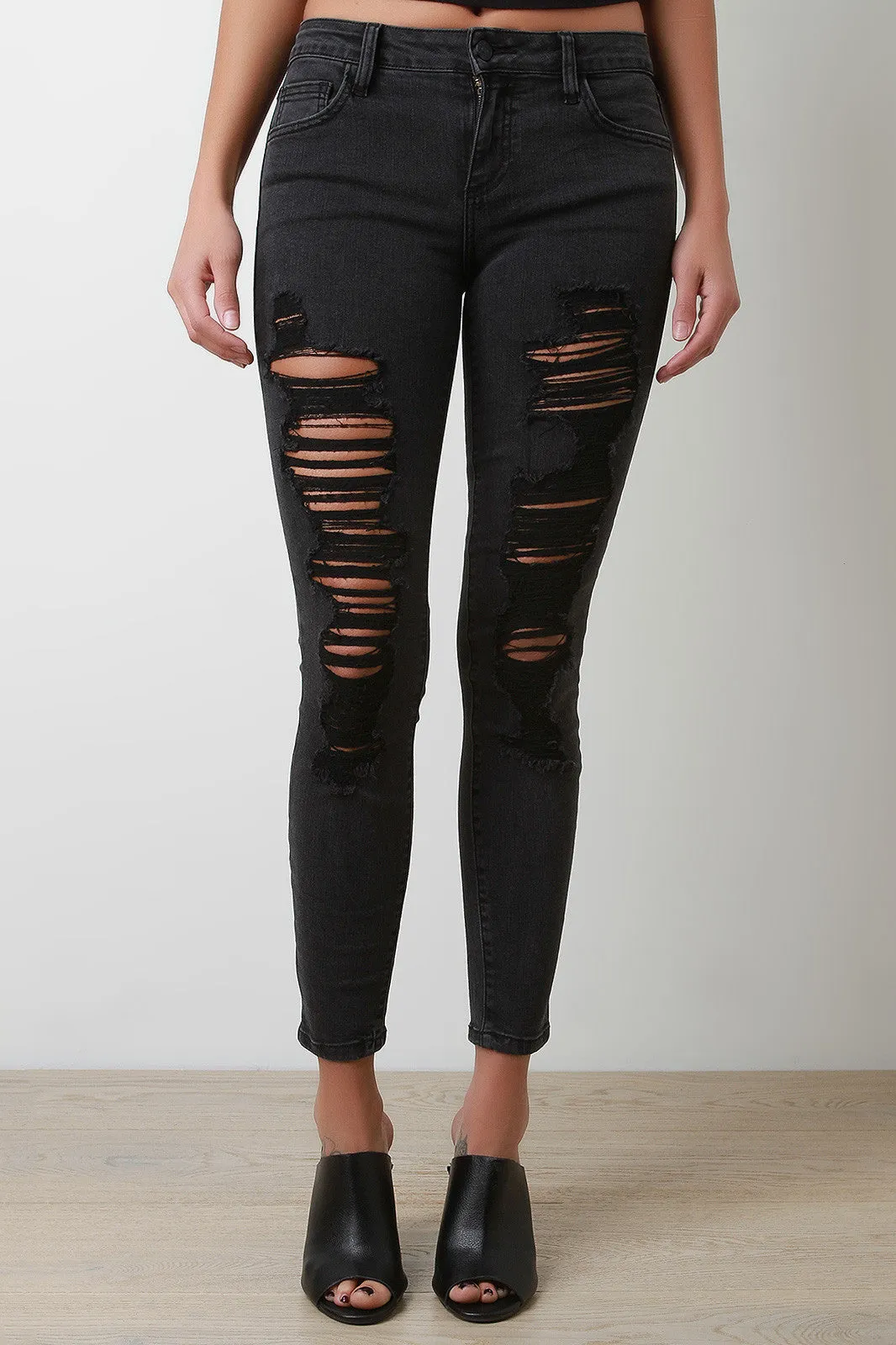 Mid-Rise Distress Skinny Jeans