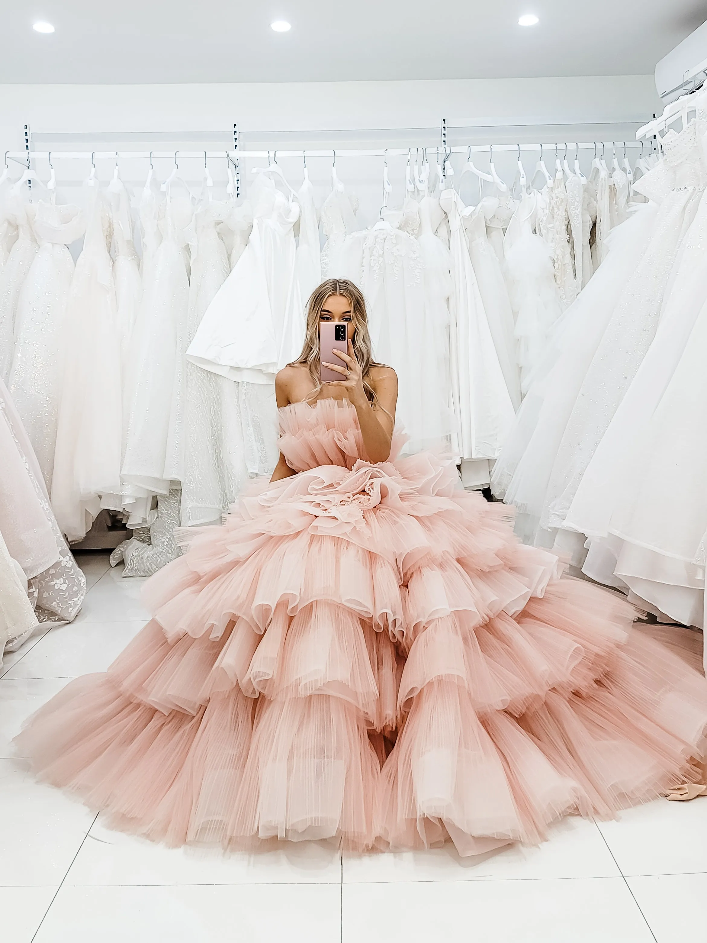 Nudish pink with a bushier top and a bushier puffy layered skirt.