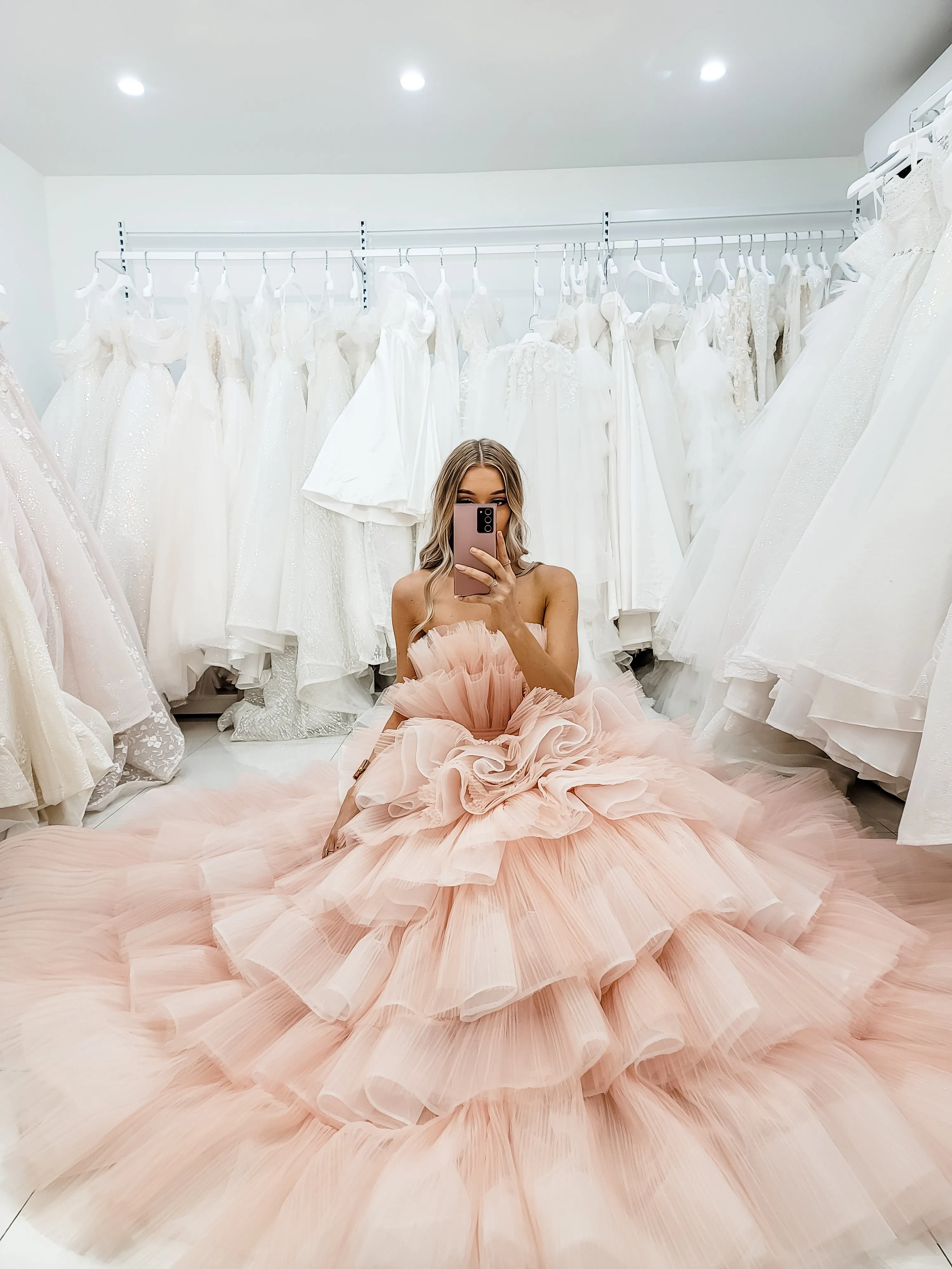 Nudish pink with a bushier top and a bushier puffy layered skirt.