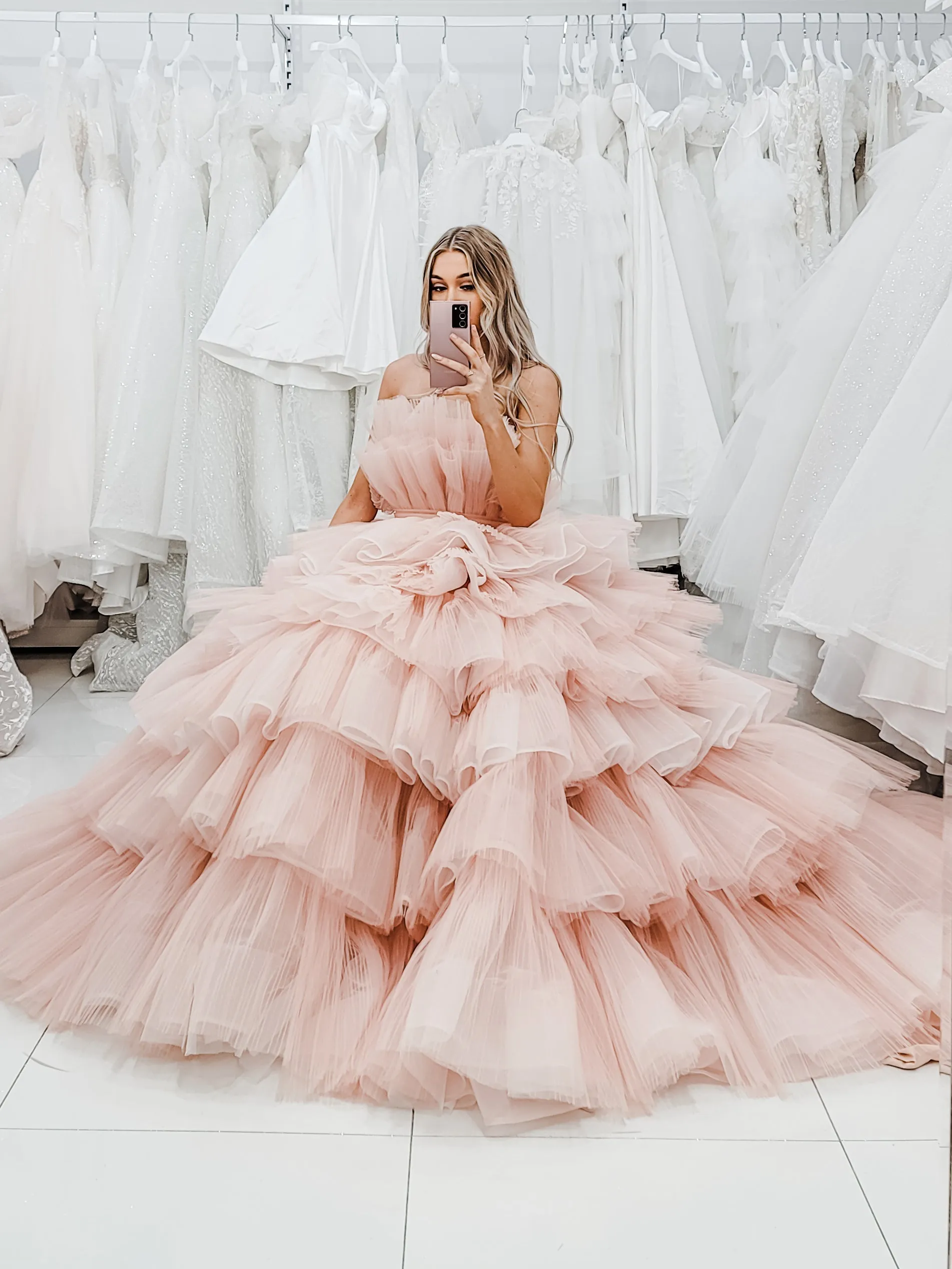 Nudish pink with a bushier top and a bushier puffy layered skirt.