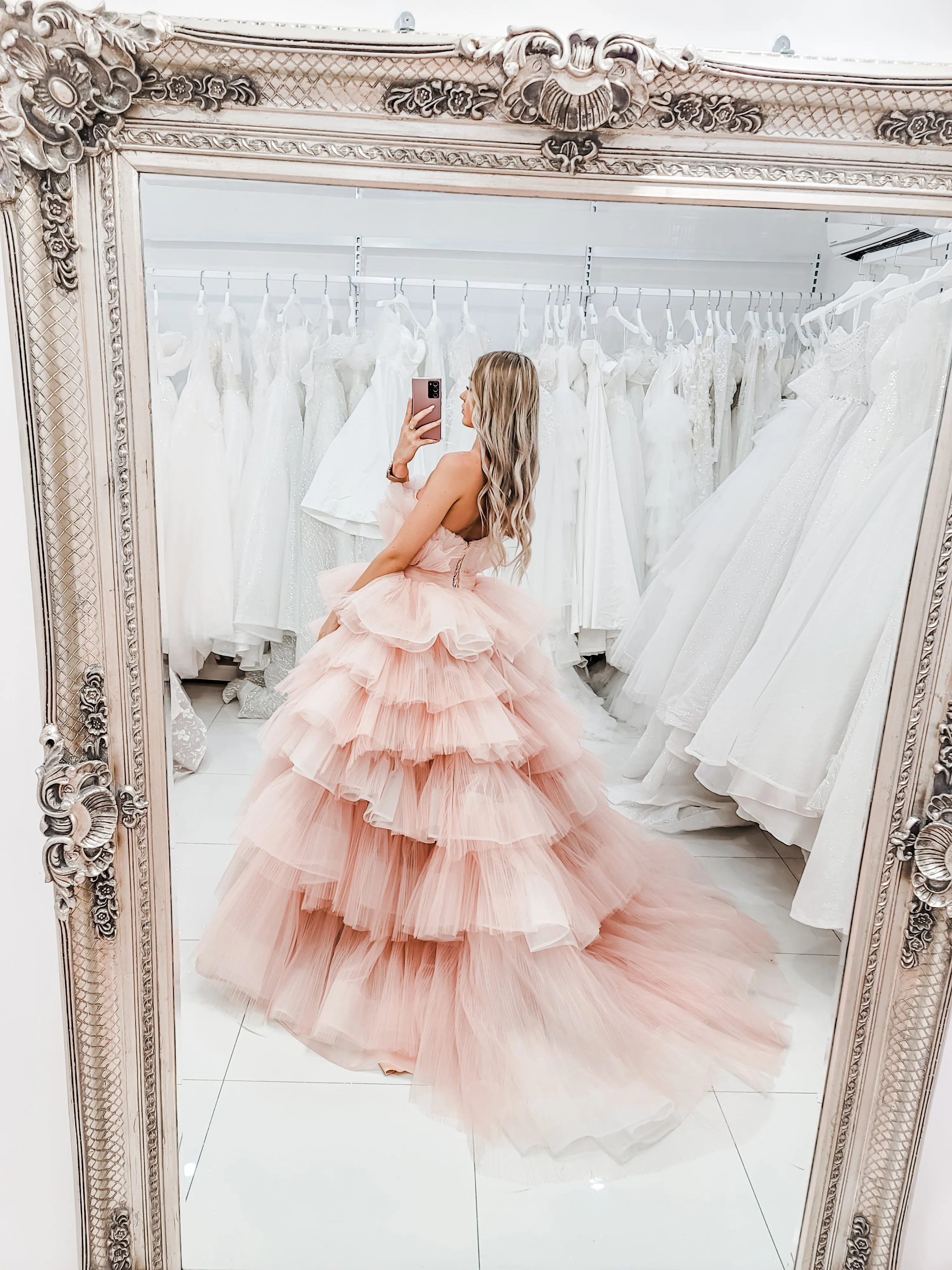 Nudish pink with a bushier top and a bushier puffy layered skirt.