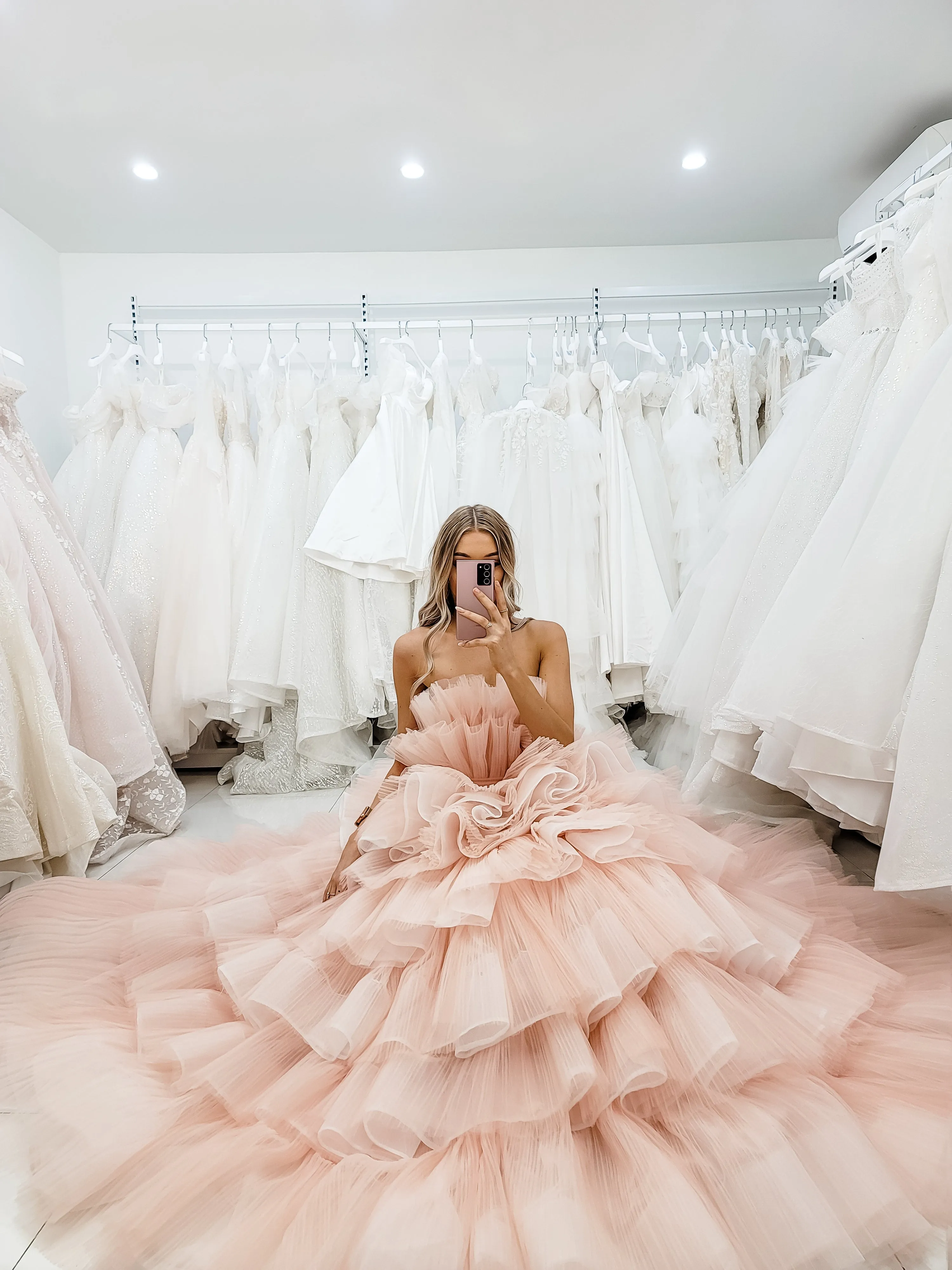 Nudish pink with a bushier top and a bushier puffy layered skirt.